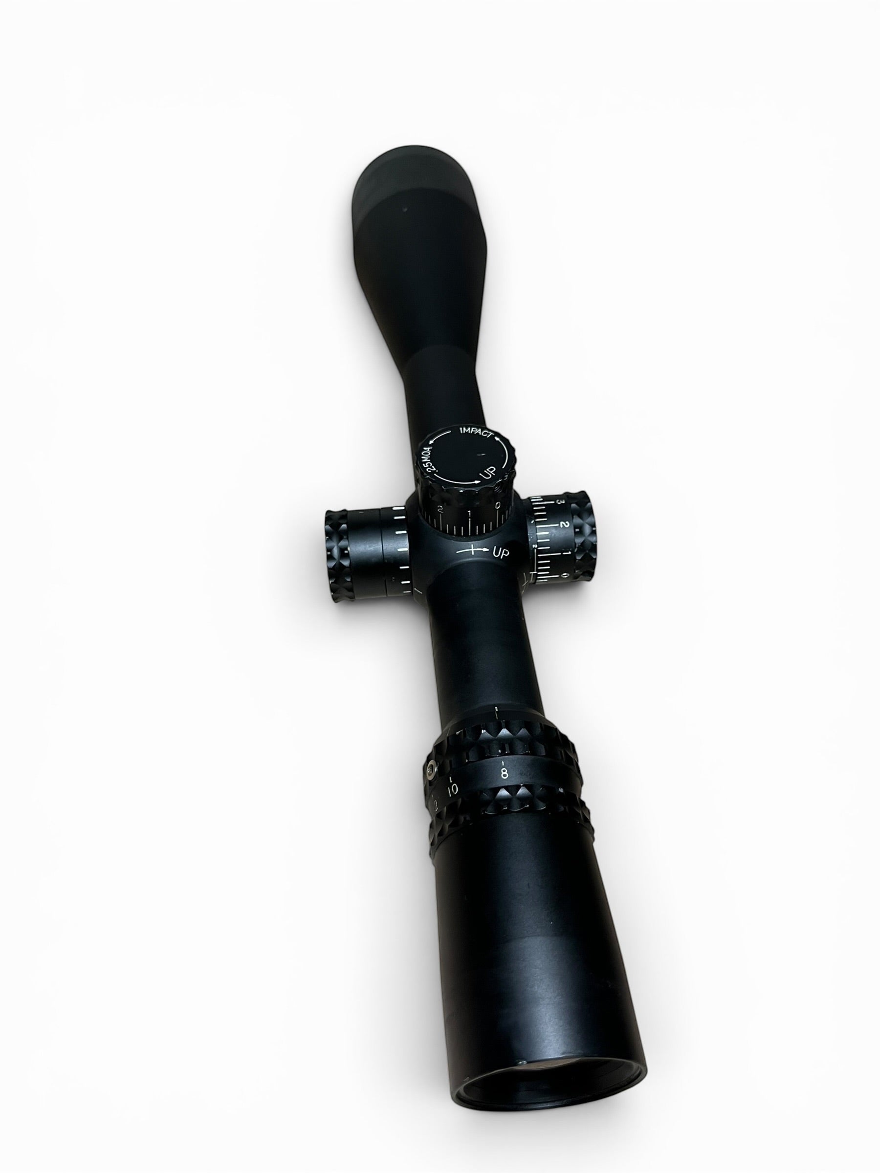 Optics Outlet UK used Nightforce NXS 8-32x56 rifle scope with illuminated NP-2DD reticle in black finish.