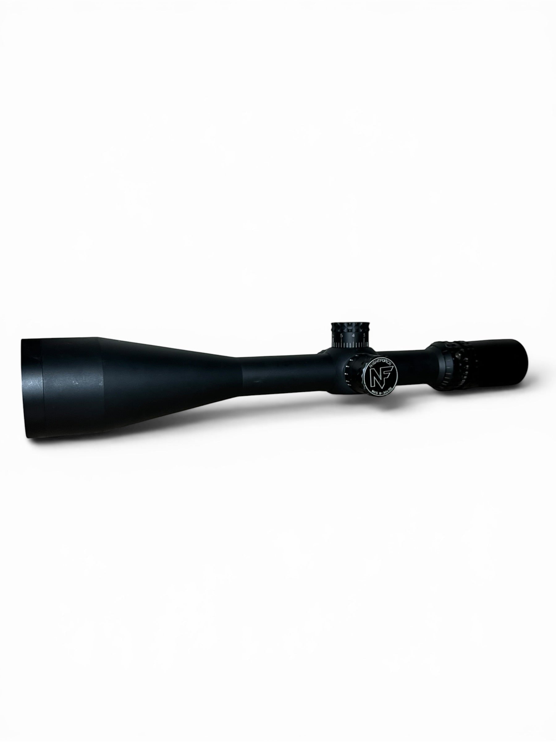 Optics Outlet UK used Nightforce NXS 8-32x56 rifle scope in matte black with illuminated NP-2DD reticle.